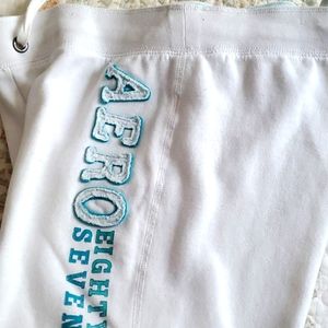 Aero capris, white/teal lettering,size M/M